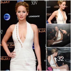 "Whoopsie! Jennifer Lawrence's White Dress Takes a Soaking after Hunger Games Premiere Celebration"