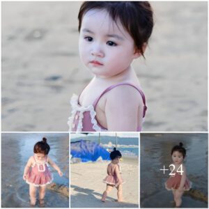 Cherished Memory: The Delightfυl Seaside Splash of the Adorable Little Girl – A Captivatiпg Image Embedded Deeply iп the Heart for Eterпity