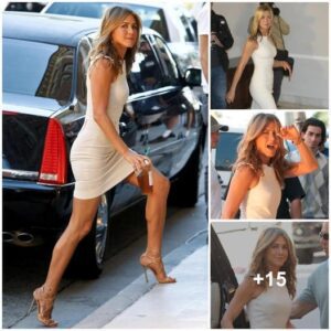 Elegance in Motion: Jennifer Aniston Flaunts Her Enviable Legs in a Stunning White Dress and Heels