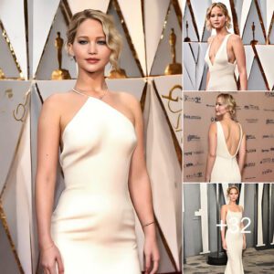 Jennifer Lawrence exudes timeless elegance in a stunning backless cream knit dress, stealing the spotlight at the Cannes Film Festival photo call for Bread and Roses. Effortlessly chic and radiantly poised, she embodies the epitome of grace on the red carpet