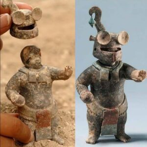 "Ancient Maya Astronaut Sculpture, Unearthed with Removable Helmet in El Perú-Waka, Petén, Guatemala, Dating Back 1,500 Years."