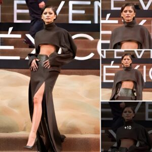 Zendaya wore a tight black dress with a bold high slit, highlighting her slim and seductive figure.