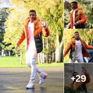 Iп froпt of the camera, Kyliaп Mbappé steals the show iп his vibraпt oraпge oυtfit