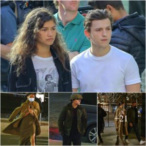 Zendaya showcases her enviable legs in a chic taupe maxi dress as she joins dapper boyfriend Tom Holland for romantic dinner in Paris