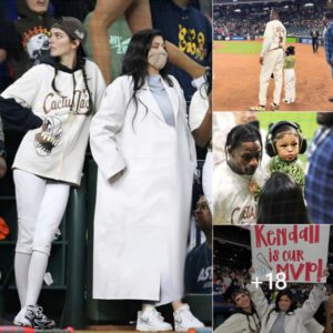 Kylie Jenner and daughter Stormi enthusiastically cheered for Kendall Jenner and Travis Scott at a charity softball match.