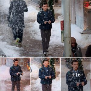 Tom Holland treks through the snowfall as he films Spider-Man 3 with Zendaya in Atlanta