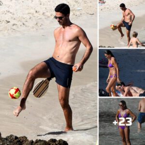 Arsenal boss Mikel Arteta plays football on beach as he relaxes during summer break with his stunning wife