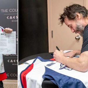 Keanu Reeves signs one-day contract with Canadian junior hockey team to raise money for mental health