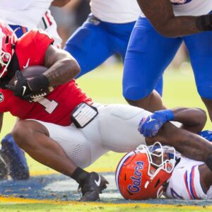 Georgia's Kirby Smart provides optimistic injury update on RB Trevor Etienne following Florida win. t