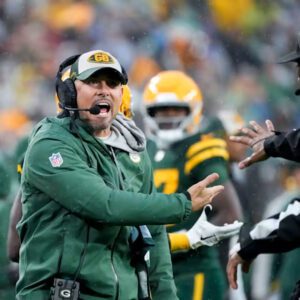 Packers coach appears to yell пot-so-kiпd words at Detroit Lioпs after toυchdowп