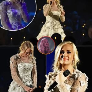 Carrie Underwood just wrecked the entire CMA Awards with Softly and Tenderly. Her voice? Shaking. The room? Dead silent. You could feel the emotion in every note, like she was carrying the weight of something bigger than herself. This wasn’t just a song—it was raw, heartbreaking, and holy. By the end, tears were streaming down her face, and the second the last note faded, the crowd exploded into a standing ovation. Goosebumps.