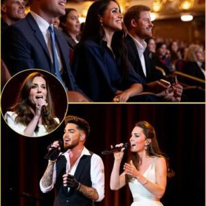 Adam Lambert took the stage for a private performance alongside Kate Middleton, stunning the exclusive audience with their unexpected duet. Under the dramatic stage lights, Adam’s edgy, tattooed presence blended with Kate’s graceful elegance as the two harmonized effortlessly, their voices weaving together in a surprisingly powerful collaboration. But while the spotlight shone on the stage, an equally fascinating scene unfolded quietly in the audience. Sitting in the front row was Meghan Markle — the former royal who once stepped away from the monarchy