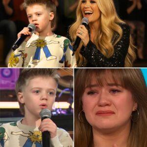 "If Dad Can’t Be by Mom’s Side, I Will.” Those trembling words, spoken by Kelly Clarkson’s young son Remy as he stepped onto the stage, didn’t just echo through the arena—they broke it wide open. nh
