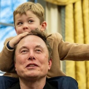 🔥SPOTTED: Elon Musk’s Son Taps His Head Like a Drum at Trump’s NYE Party?! ws