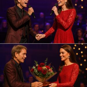 In a scene that had the entire Royal Albert Hall on its feet, Sir Cliff Richard gently took the hand of Princess Kate as the two performed a heart‑warming... ws