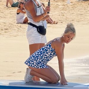SURPRISE 🔥 This is Carrie Underwood in a modest bathing suit compared to bikinis and thongs and even most one piece bathing suits that women wear today. 👙 nh