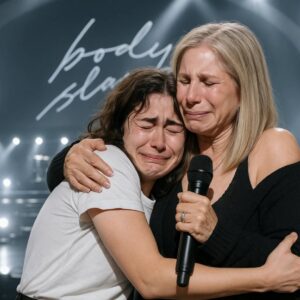The crowd at Los Angeles’ Staples Center held its breath as Barbra Streisand paused mid-song, her eyes locking onto a familiar face in the front row. A sign read: “You Inspired My Journey to Broadway — Thank You.” ws
