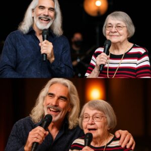 Over 60,000 fans rose to their feet last night — not for the dazzling lights or soaring music, but for one quiet, unforgettable act of grace from Guy Penrod. ws