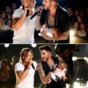 The lights dimmed, and the crowd expected a song — but no one expected this. Adam Lambert stepped onto the Sydney Opera House stage, his newborn son resting against his chest nh
