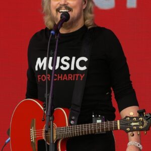 Two anonymous Powerball winners gave Barry Gibb $800M to launch a charity tour. The goal: bring hope and support to struggling communities through music.