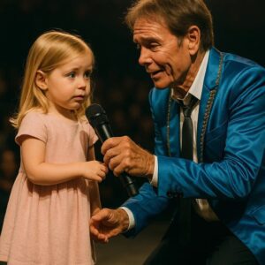 “She’s the next shining star,” Cliff Richard said with a proud smile, and in that instant, his concert turned into something far beyond music — it became a glimpse of the future. ws