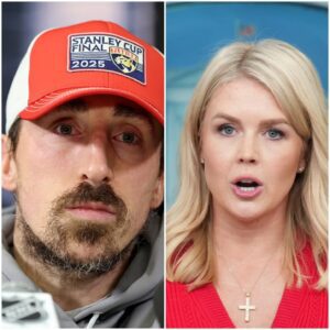 “Sit down, Barbie.” — Brad Marchand suddenly called Karoline Leavitt a “T.r.u.m.p puppet” live on air — and just minutes later, when she tried to strike back, she was met with a ruthless truth from the hockey star that left the entire studio in stunned silence, forcing her to shrink back into her chair. What exactly did Marchand say that cut straight through her talking points and left her fumbling for words? And why did the entire studio audience erupt into thunderous applause, rising to their feet — not for Karoline, but for the NHL star who turned a heated exchange into a masterclass in biting wit and icy composure?