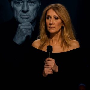 Celine Dion walked onto the stage before 70,000 fans and began to sing “Because You Loved Me” in honor of Robert Redford, the entire arena froze in stunned silence. - H