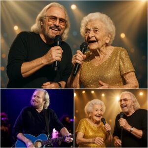 A Once-in-a-Lifetime Duet: Barry Gibb and a Fan Create an Unforgettable Concert Moment_cz