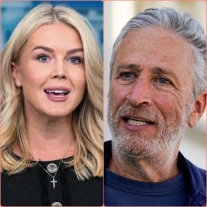 "YOU WERE BEATEN — PAY NOW!" — Jon Stewart sues Karoline Leavitt and the network for $50 million after a shocking live-TV verbal attack.