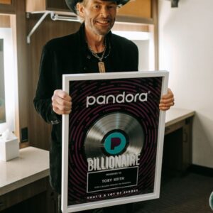 Backstage, Toby Keith held a plaque few artists could ever dream of — Pandora’s honor for over 3 billion streams. ws