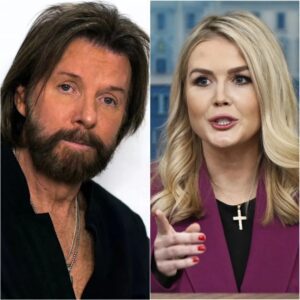 “YOU THINK I’M DONE? THINK AGAIN!” Ronnie Dunn Hits Karoline Leavitt with a $50 Million Lawsuit After Shocking Live Ambush!