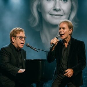 Cliff Richard & Elton John Sing Olivia Home: A “Hopelessly Devoted” Farewell That Silenced Wembley. ws