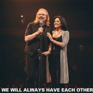 BREAKING: Barry Gibb Surprises Fans by Bringing His Wife on Stage — A Tender Farewell That Left Thousands in Tears. For decades, his songs carried the echoes of love and loss. lht