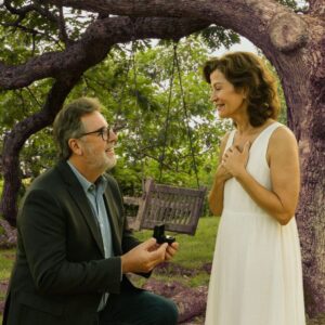 THE OAK TREE PROMISE: Vince Gill dropped to one knee again — but this time, it wasn’t beneath the spotlight. It was beneath the same old oak tree in Tennessee where his love story with Amy Grant first took root decades ago.