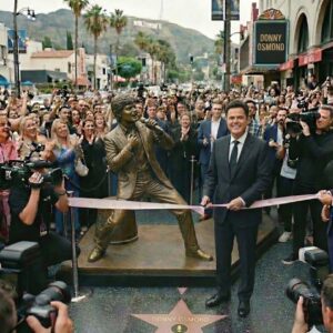 THE PURPLE REIGN IMMORTALIZED: DONNY OSMOND BREAKS HOLLYWOOD TRADITION WITH HISTORIC STATUE UNVEILING